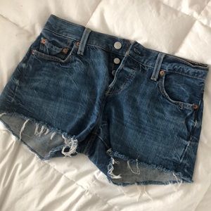 Levi 501 mid rise sits at natural waist shorts